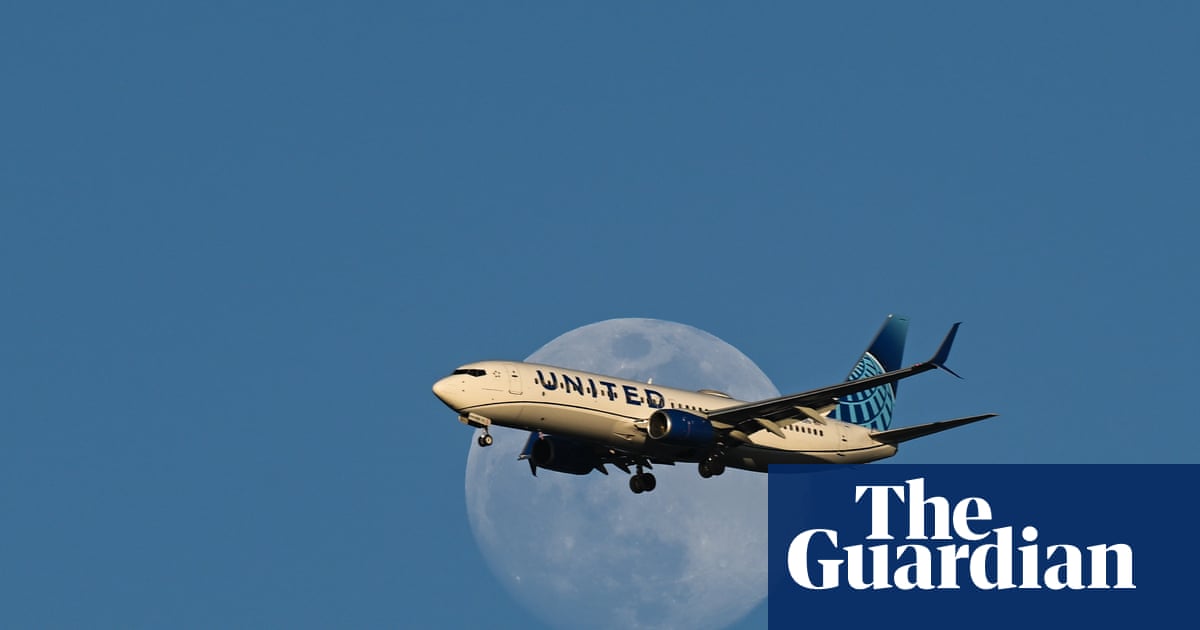 United flight narrowly avoids US military helicopter in California | US news