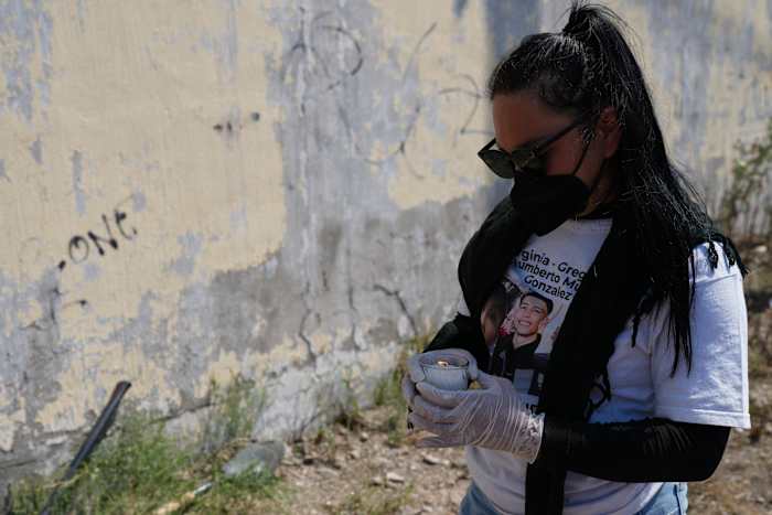 Mexico says a third of 130,000 missing people might be alive, fueling criticisms by families