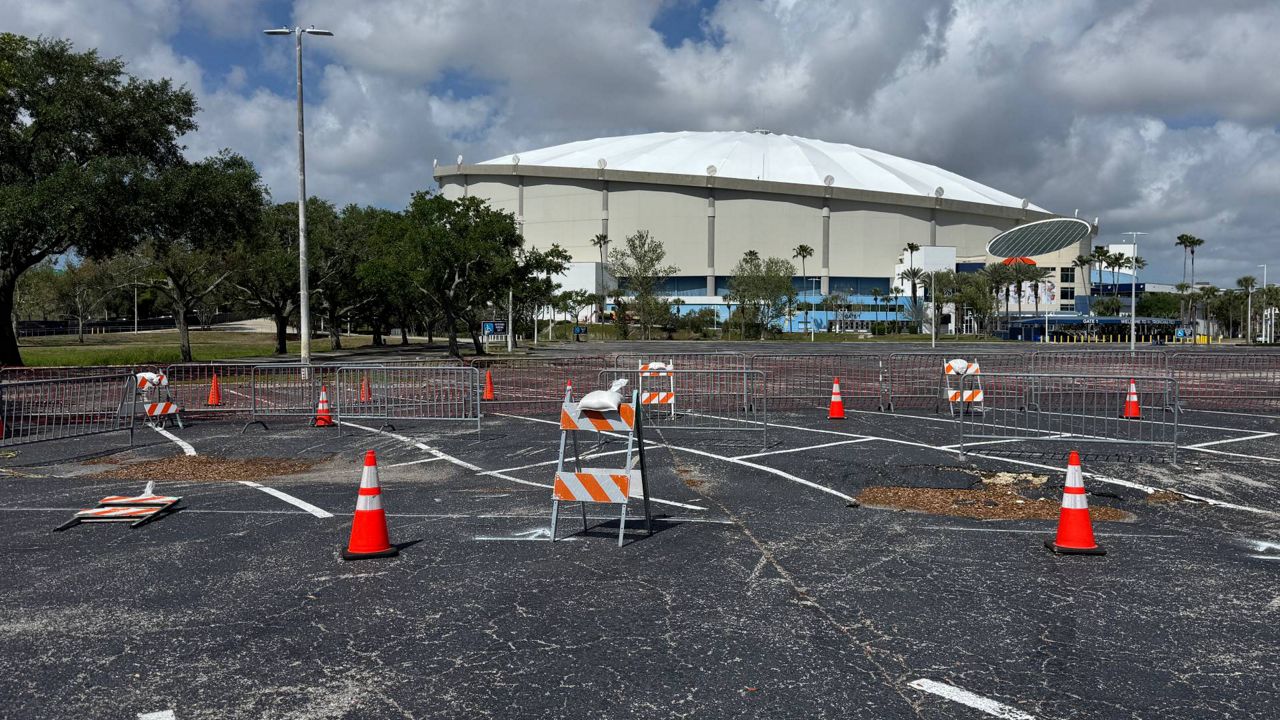 Small depression forms in Tropicana Field parking lot